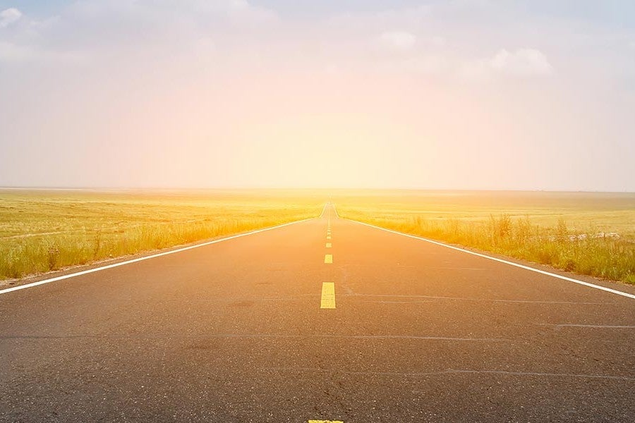Scenic open road at golden hour, evoking the drive awaiting your new Mercedes-Benz