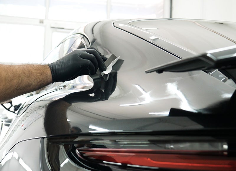 Auto body dent repair in progress